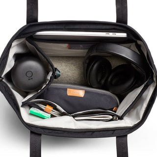 Bellroy Tokyo Tote Second Edition interior showing organized compartments with headphones and laptop inside