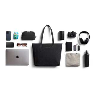 Bellroy Tokyo Tote Second Edition black woven fabric tote with daily essentials neatly arranged around it