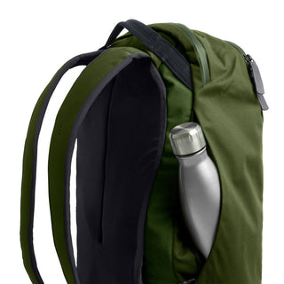 Bellroy Transit Workpack 20L in olive green with padded straps and exterior water bottle pocket visible