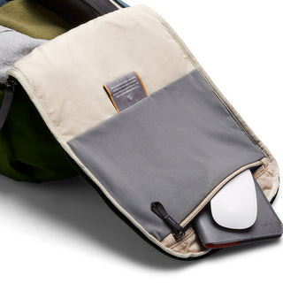 Bellroy Transit Workpack 20L interior sleeve with padded pocket holding a mouse and notebook