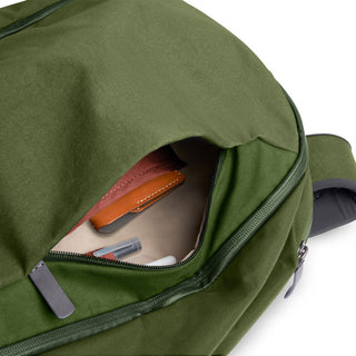 Bellroy Transit Workpack 20L in green woven fabric with leather wallet inside front zippered pocket