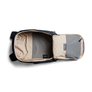 Bellroy Transit Workpack 20L (Second Edition) shown open with beige and grey recycled fabric interior compartments
