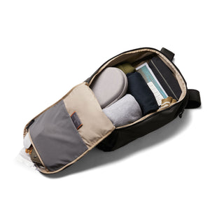 Bellroy Transit Workpack 20L (Second Edition) open black backpack showing organized packed clothing and accessories