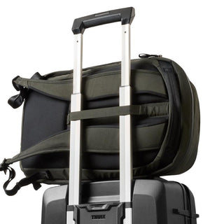 Bellroy Transit Workpack 20L (Second Edition) backpack in olive green attached to suitcase handle