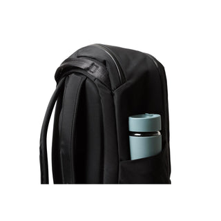 Bellroy Transit Workpack 26L black backpack side view with water bottle in pocket