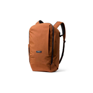 Bellroy Transit Workpack 26L in rust fabric with sleek vertical zipper and padded shoulder straps visible