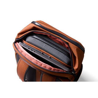 Bellroy Transit Workpack 26L in brown with organized laptop and accessory compartments shown open