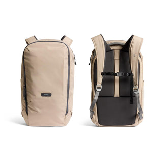 Bellroy Transit Workpack 26L in beige showing front smooth fabric and padded back straps with chest buckle