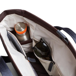 Bellroy Tokyo Messenger Bag 14" open showing organized interior with bottle and sunglasses pockets