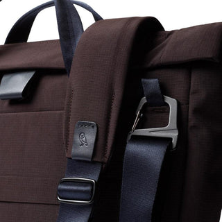 Bellroy Tokyo Messenger Bag 14" close-up showing dark brown fabric and black adjustable strap with metal buckle
