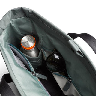 Bellroy Tokyo Messenger Bag 14" with organized interior compartments holding bottle and sunglasses