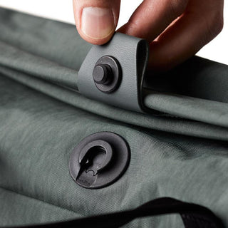 Bellroy Tokyo Messenger Bag 14" in green showing close-up of durable fabric and magnetic closure detail