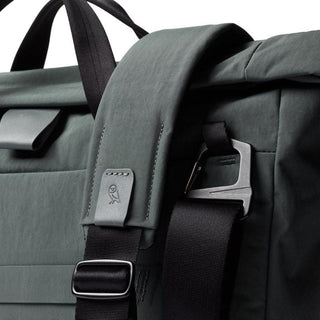 Bellroy Tokyo Messenger Bag 14" in muted green with padded shoulder strap and durable recycled fabric
