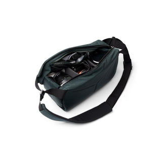 Bellroy Venture Sling 10L - Camera Edition open with black padded compartments and adjustable strap