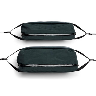 Bellroy Venture Sling 10L - Camera Edition in dark green recycled nylon with silver zipper details shown flat