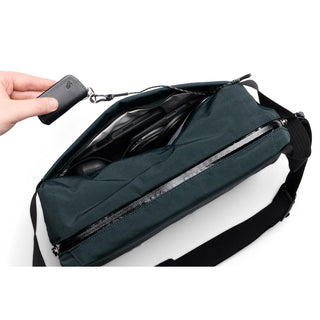 Bellroy Venture Sling 10L - Camera Edition in dark green recycled fabric with zippered main compartment open