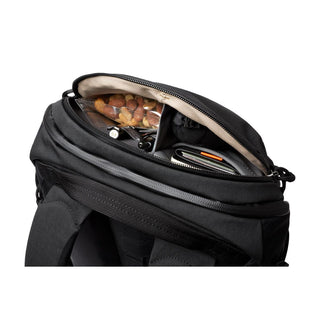 Bellroy Venture Ready Pack 20L black backpack open top showing organized interior compartments and contents