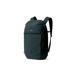 Bellroy Venture Ready Pack 20L in dark green with sleek, recycled fabric and adjustable padded straps visible from side angle