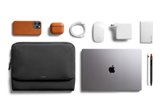 Bellroy Laptop Caddy 16 black nylon fabric with MacBook and tech accessories neatly arranged