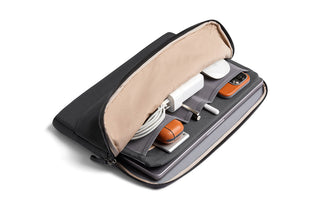 Bellroy Laptop Caddy 14" open to show organized tech accessories inside beige interior lining