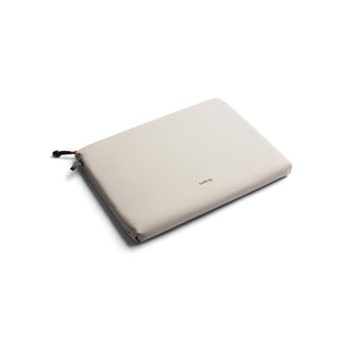 Bellroy Lite Laptop Sleeve 14" in light beige with minimalist design and soft fabric texture