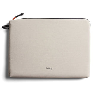 Bellroy Lite Laptop Sleeve 14" in beige recycled fabric with minimalist logo and black zipper pull tab