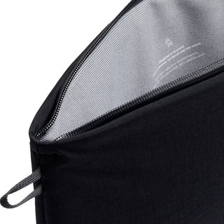 Bellroy Lite Laptop Sleeve 14" showing black recycled fabric exterior and light grey striped interior lining