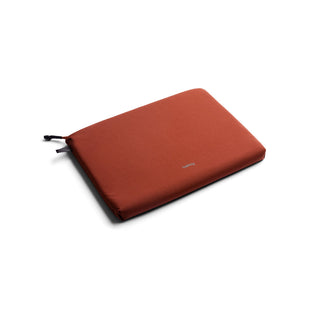 Bellroy Lite Laptop Sleeve 14" in rust color with zipped closure and smooth recycled fabric texture