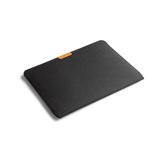 Bellroy Laptop Sleeve 16" in black recycled fabric with slim, minimalist design and leather logo tab