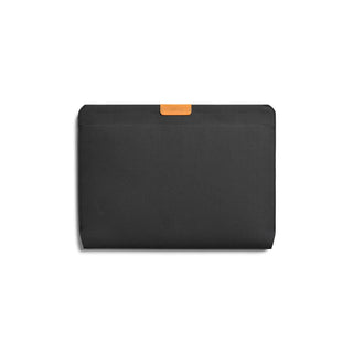 Bellroy Laptop Sleeve 16" in black recycled fabric with tan leather logo tab, slim and protective design