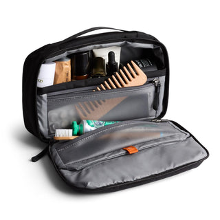 Bellroy Hanging Toiletry Kit open showing organizational compartments and travel essentials inside