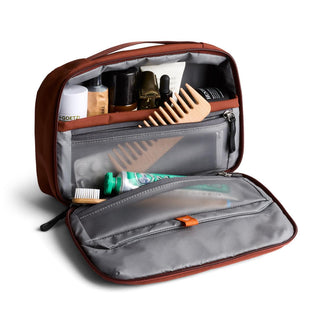 Bellroy Hanging Toiletry Kit open showing organized compartments with grooming essentials inside
