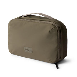 Bellroy Hanging Toiletry Kit in olive green made from recycled nylon with sturdy handle and zip closure