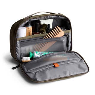 Bellroy Hanging Toiletry Kit open showing organized compartments with travel essentials inside