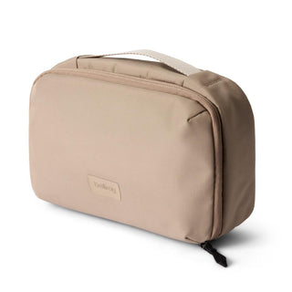 Bellroy Hanging Toiletry Kit in beige with recycled fabric and compact rectangular design