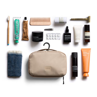 Bellroy Hanging Toiletry Kit in beige with compact design and durable recycled nylon material
