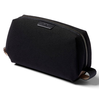 Bellroy Toiletry Kit in black recycled fabric with durable zipper and compact rectangular shape