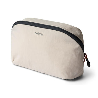 Bellroy Lite Packing Pouch 3L in beige recycled nylon with curved zipper and compact design