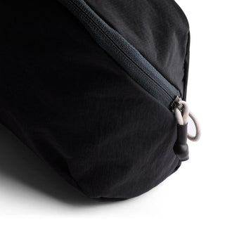 Bellroy Lite Packing Pouch 3L in black recycled nylon with zipper and loop pull detail close-up view
