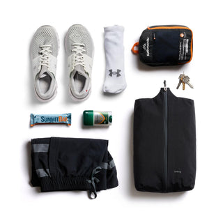 Bellroy Lite Packing Caddy 10L in black with lightweight travel essentials and compact packing design