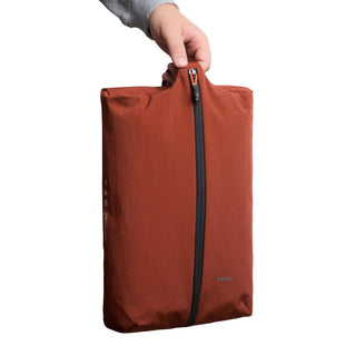 Bellroy Lite Packing Caddy 10L in rust brown, eco-friendly recycled nylon fabric with vertical zipper closure