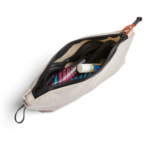 Bellroy Lite Pouch Duo in light fabric with zipper, showing organized storage for small travel items