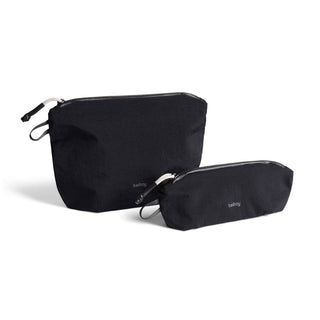 Bellroy Lite Pouch Duo showing two black recycled nylon pouches with minimalist design and zipper closures