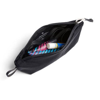 Bellroy Lite Pouch Duo in black recycled nylon with zipper and travel essentials inside pouch