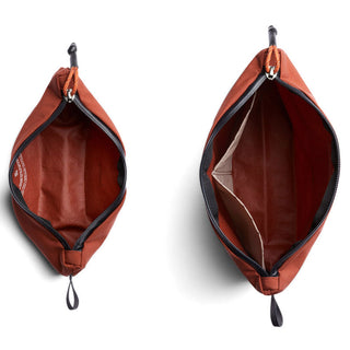 Bellroy Lite Pouch Duo in rust fabric showing two open compartments with zipper closures and internal pocket