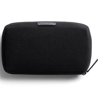 Bellroy Tech Kit in black textured recycled fabric with zipper closure and minimalist design