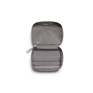 Bellroy Tech Kit Compact open showing organized interior with elastic straps and recycled fabric lining