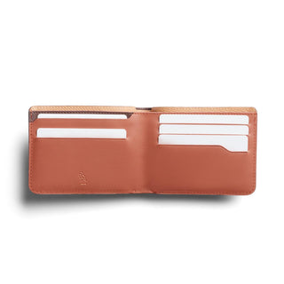 Bellroy Hide & Seek LO Premium wallet open showing multiple card slots in tan leather interior
