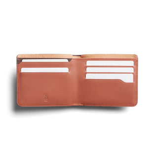 Bellroy Hide & Seek HI Premium wallet open showing smooth tan leather with multiple card slots and fabric lining