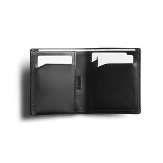 Bellroy Note Sleeve open black leather wallet showing slim card pockets and stitching details